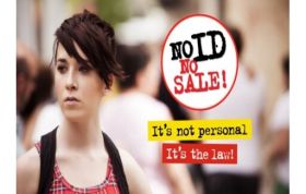 Woman holding a "No Sale" sign, promoting responsible retail practices, representing the Award for Underage Sales Prevention Online course.