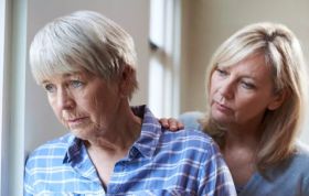 A younger woman and an older woman share a quiet moment, representing the Dementia Clinical Guidelines Online course.