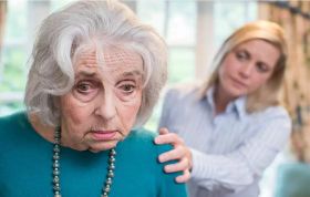 An older woman smiles at her daughter, representing the Dementia Interventions for Cognitive and Non-Cognitive Online course.