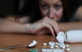 Young man in black hoodie looking at camera with neutral expression representing Drug Awareness Online course.
