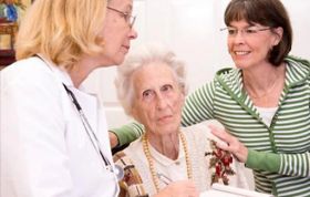 Woman conversing with an older woman, representing the End of Life Advanced Care Planning Online course for compassionate caregiving.