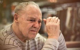 Elderly man sitting with a dull expression, representing Mental Capacity Act and protecting vulnerable adults’ rights and freedoms.