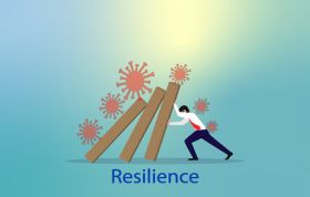 Businessman pushes a block labeled 'resilience' upward, symbolizing strength for the Personal Resilience Online course.